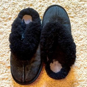 UGG Black Slipper size 6. Worn. Heal is worn off